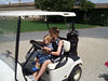 Katherine Copley > Max and Jack in te golf cart